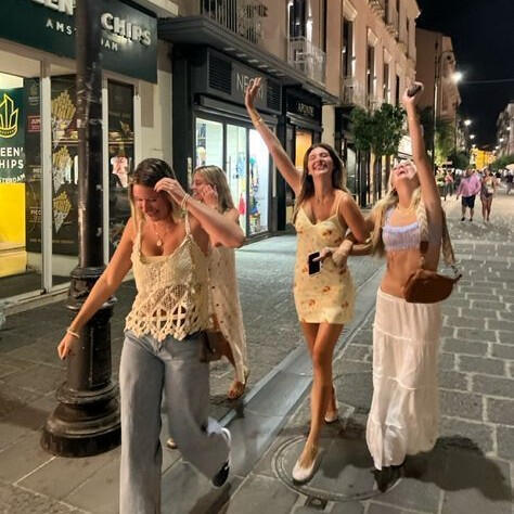 Travelers exploring a city with a local guide